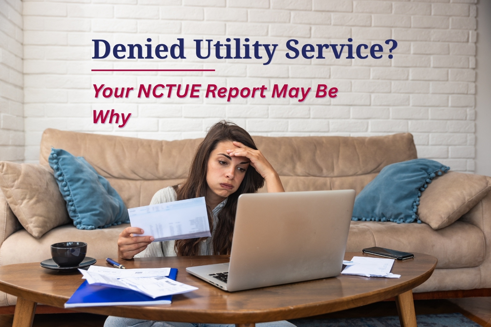 Woman reviewing a utility bill after an NCTUE report affected her utility service